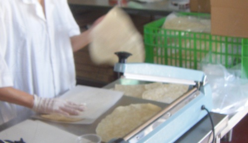 Tortillas being hand packed